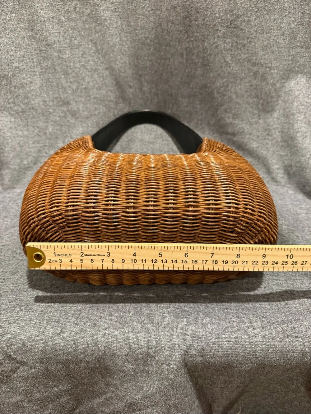 Woven Brown Rattan Basket Handbag w/Black Handles Pre-owned. Good condition